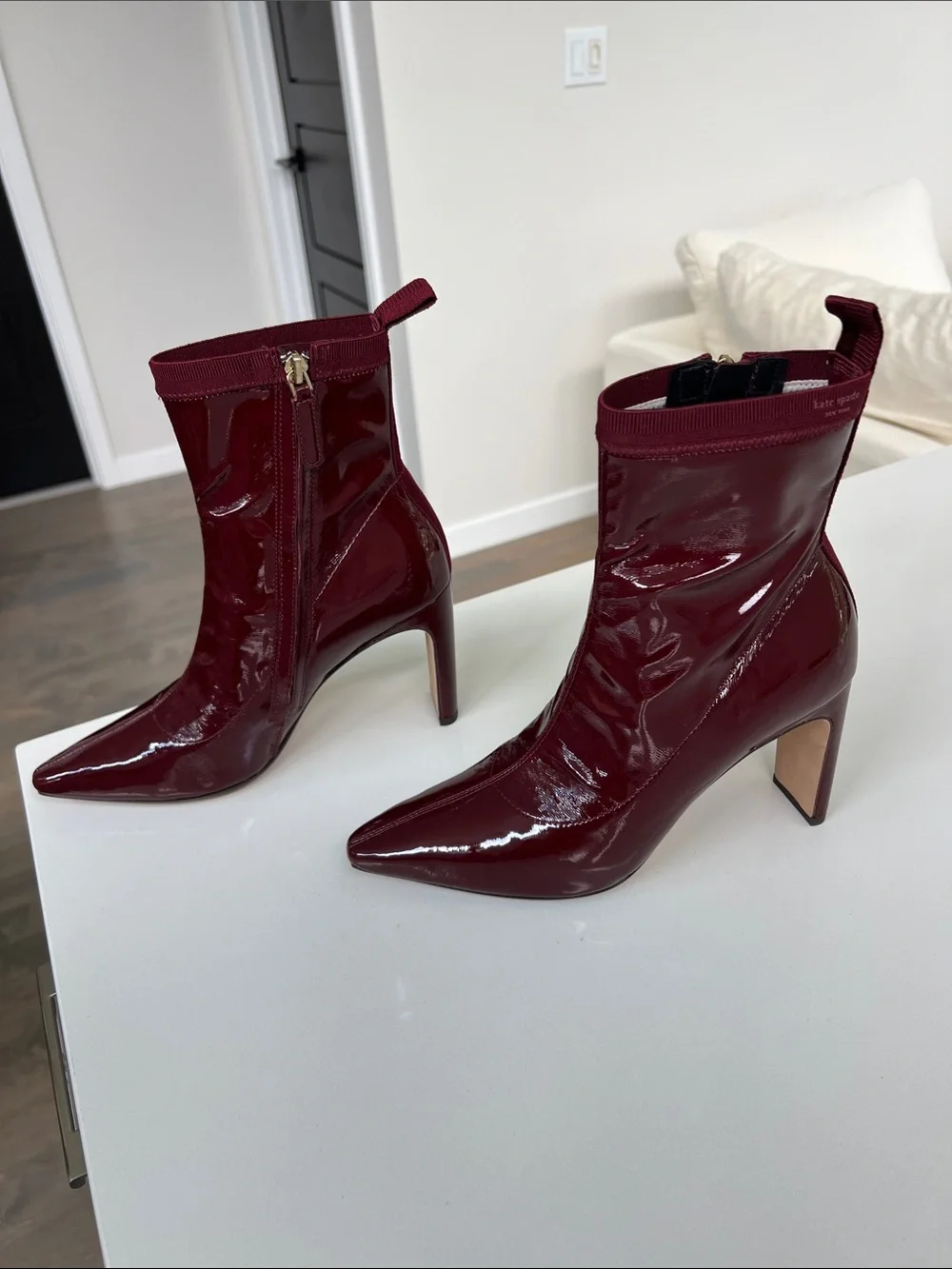 Kate Spade down under stretch patent cordovan dark red pointed toe booties ankle